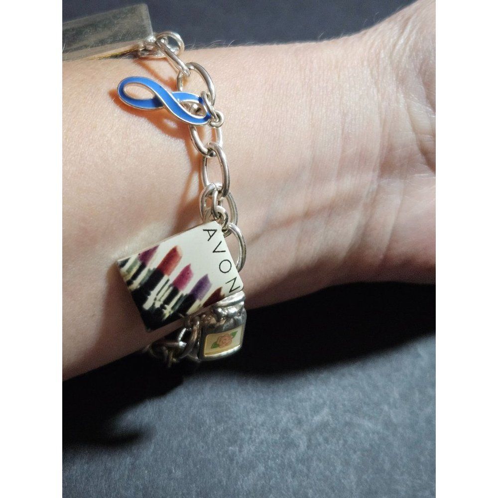 Avon vintage silver tone 125 year charm bracelet 7-8"